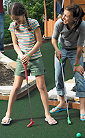 Mother and Daughter Golfing