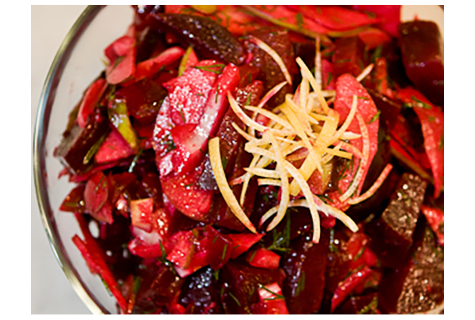 Beets are making a comeback these days and after tasting this salad, it's not surprising. Be sure to roast the beets first to enhance the flavour but also because doing so makes them so much easier to work with. Top with a bit of goat cheese and you're sure to impress.