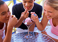 Friends sharing ice cream