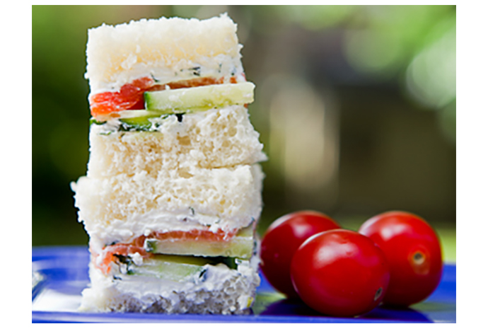 Toddlers love these neat little sandwichesbecause they're just the right size and because the crusts are cut off. But we all know that adults have a hard time resisting these classic afternoon snacks, too.