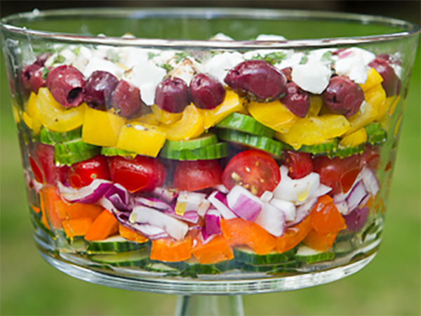 The picture says it all. This is a beautiful way to serve one of Europe's best salad recipes. You won't even feel badly about ruining the presentation once you taste how good it is.