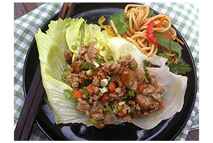 Lettuce wraps are a deliciously messy combo of savoury filling and crunchy lettuce. They'll bring out the kid in everyone and your guests will love the delicious Asian flair. 
