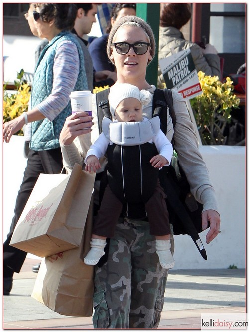 Singer Pink and her daughter Willow Hart out shopping at 98% Angel and then getting on a swing set in Malibu, CA on February 18, 2012.
