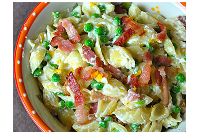 For a more nutritious take on good old-fashioned mac and cheese, replace heavy butter and cheddar with light but protein-dense ricotta and Meyer lemon juice. Mini shells and petite peas make this bite-sized fare perfect for the little people at your table, but the sophisticated taste means mom and dad can enjoy it too. 