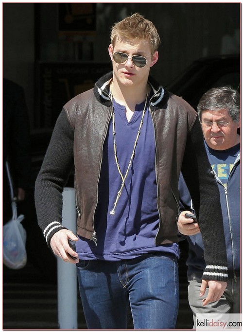 ?The Hunger Games? actor Alexander Ludwig touched down at the LAX airport in Los Angeles, California on March 22, 2012. He walked through the airport with a young lady, gave her a hug then headed for the parking structure.