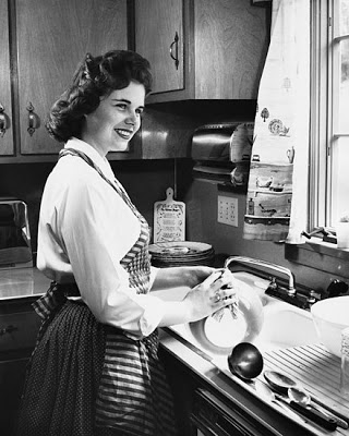 woman-washing-dishes-smiling