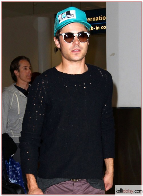 &quot;The Lucky One&quot; star Zac Efron touches down in Sydney, Australia on April 8th, 2012. RESTRICTIONS APPLY: USA ONLY