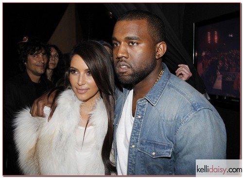The Kanye West Ready-To-Wear Fall/Winter 2012 show took place in part of Paris Fashion Week at Halle Freyssinet in Paris, France on March 6, 2012. Pictured: Kanye West with Kim Kardashian RESTRICTIONS APPLY: USA ONLY