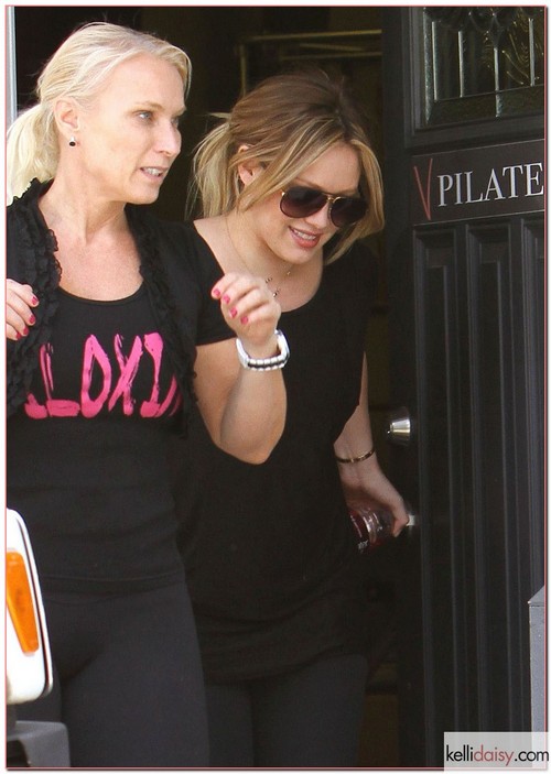 'She Wants Me' actress Hilary Duff and a friend seen leaving a pilates class in Los Angeles, California on April 2, 2012.