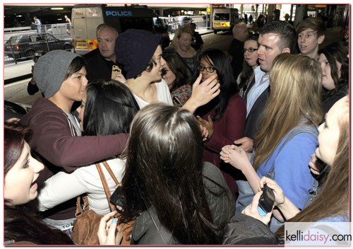 British boyband One Direction are swamped by fans as they land at Heathrow Airport on a flight from Auckland, New Zealand on April 24, 2012 in London, UK. RESTRICTIONS APPLY: USA/AUSTRALIA/NEW ZEALAND ONLY