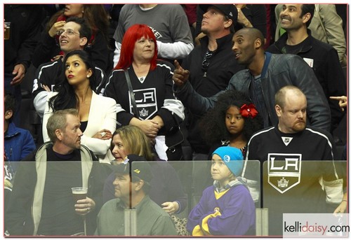 Laker star Kobe Bryant and his estranged wife Vanessa are seen enjoying the Los Angeles Kings vs. Vancouver Canucks NHL playoff game with their two daughters Natalia and Gianna at the Staples Center in Los Angeles, California on April 15, 2012. Vanessa filed from divorce from Kobe in December but it looks like the family might be getting back together. Kobe sat out of the Lakers game earlier with an injury but stuck around to watch the hockey game. Sitting a couple of rows below them were David Beckham, Victoria Beckham and their sons Brooklyn, Romeo and Cruz.