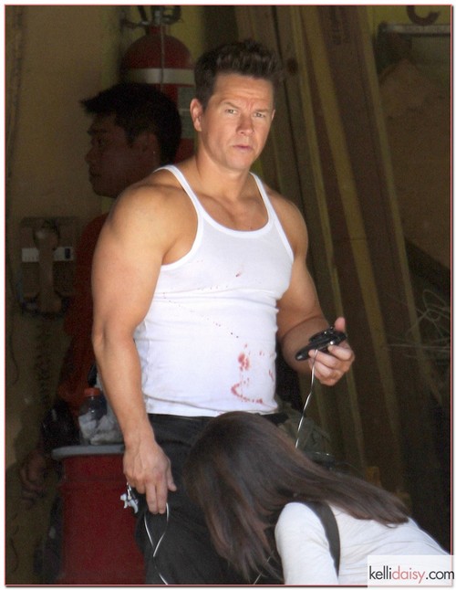 Actors Mark Wahlberg and Anthony Mackie are spotted with bloody shirts on the set of &quot;Pain and Gain&quot; on April 25, 2012 in Miami, FL. Director Michael Bay was also spotted walking around the set.