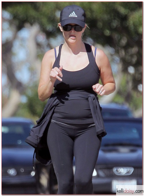 Mom-to-be actress Reese Witherspoon enjoyed a lovely run with a friend in Brentwood, California on April 24, 2012.
