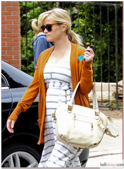 Pregnant actress Reese Witherspoon drove out to check on her new house which is under construction in Bel Air, California on May 2, 2012.