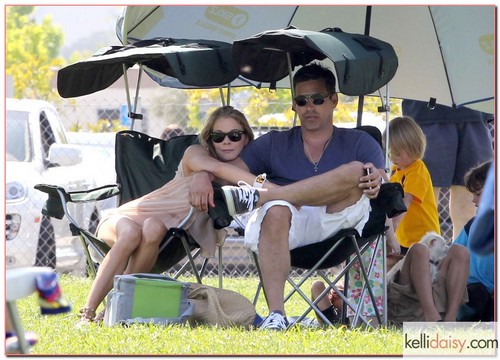 Couple LeAnn Rimes and Eddie Cibrian cheering on Eddie's son Jake at his soccer game in Calabasas, California on May 6, 2012. Also in attendance was Eddie's ex-wife Brandi Glanville and their other son Mason.