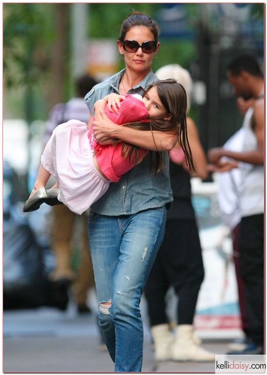 'Jack And Jill' actress Katie Holmes and her daughter Suri Cruise spotted out and about in New York City, New York on June 25, 2012. Suri did not look too happy so Katie carried her for part of the way.