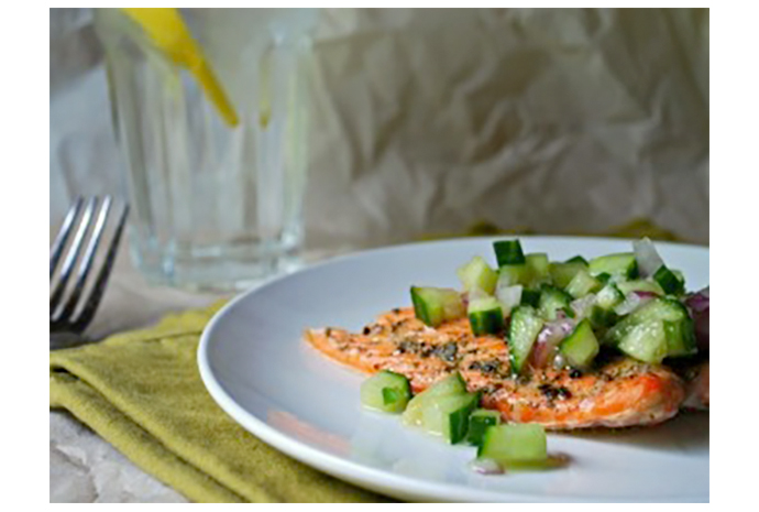 This recipe takes the heat off you when it comes to summer entertaining. Roast or grill your salmon in advance of your guest's arrival, and serve it with the accompanying honey and lime-infused cucumber salsa. 