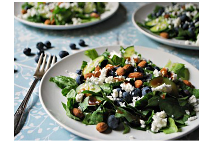 Whether you serve this as a side dish or as the main meal, this salad is certain to become a family favourite, thanks to the tantalizing combination of sweet blueberries, crunchy almonds and salty feta. Blanketed with a small drizzle of our homemade maple mustard vinaigrette, this meal can be on your table in less than 15 minutes. 