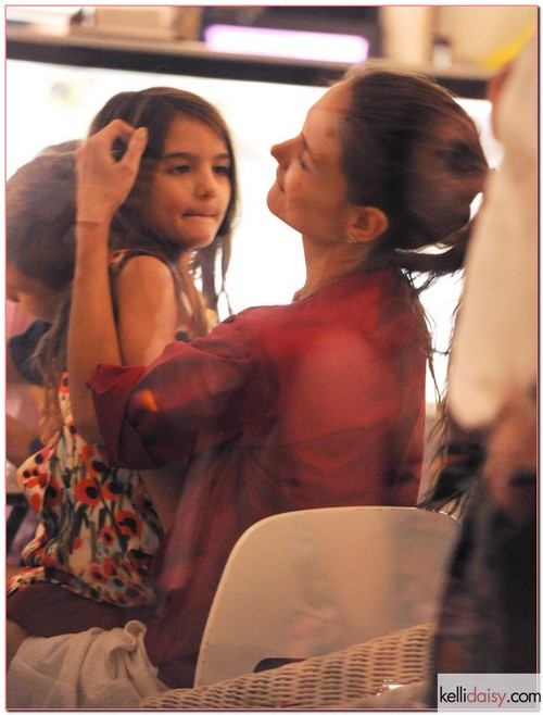 Actress Katie Holmes and daughter Suri Cruise getting some late night ice cream in New York City, New York on July 3, 2012. Katie is trying to make Suri as happy as possible with her bitter divorce battle with Tom Cruise heating up.
