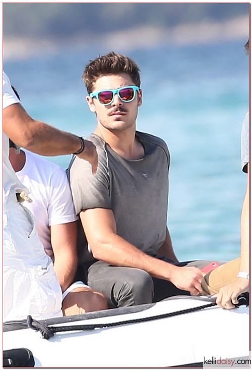 Zac Efron Vacations In Saint-Tropez "High School Musical" star Zac Efron boards a boat with some friends while vacationing in Saint-Tropez, France on July 4, 2012. Zac wasn't dressed in normal beach attire, instead opting for a t-shirt and jeans. "High School Musical" star Zac Efron boards a boat with some friends while vacationing in Saint-Tropez, France on July 4, 2012. Zac wasn't dressed in normal beach attire, instead opting for a t-shirt and jeans. RESTRICTIONS APPLY: USA/AUSTRALIA ONLY