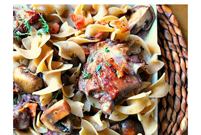 A popular French country dish comprised of tender chicken, plump mushrooms and crisp bacon, coq au vin is a time-consuming meal but we've adapted it to appeal to busy moms. It just so happens to taste even better when it's made a day or two in advance. 