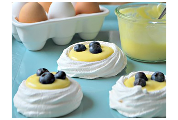 Pavlova Nests With Lemon Curd and Berries This seemingly impressive dessert is effortless in execution and can be made in advance, making it perfect for easy entertaining. Infused with eggs and citrus—a popular flavour of the season—Pavlova is the ideal sweet finish to any spring-inspired meal.