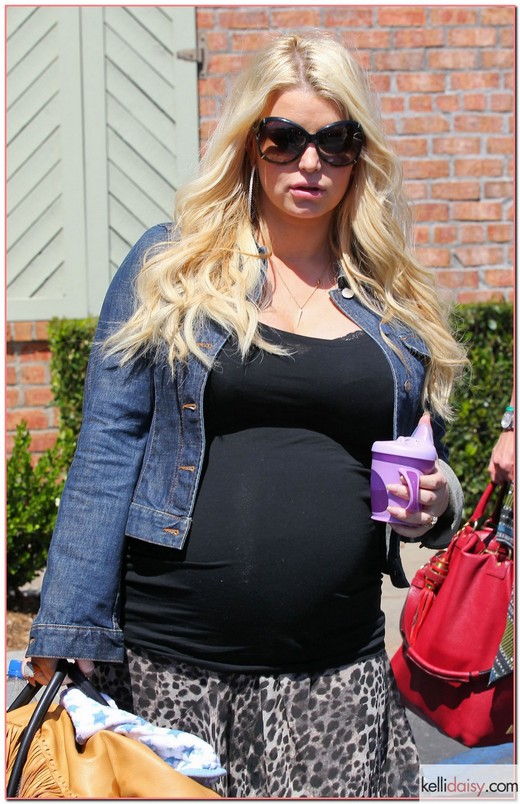 51059890 Pregnant Jessica Simpson's curves are bursting at the seams in a tight black shirt as she takes her family to lunch at King's Fish House In Calabasas, California on April 6, 2013. FameFlynet, Inc - Beverly Hills, CA, USA - +1 (818) 307-4813