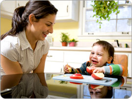 Babysitter_feeding_boy_BRAND_PHO_EN