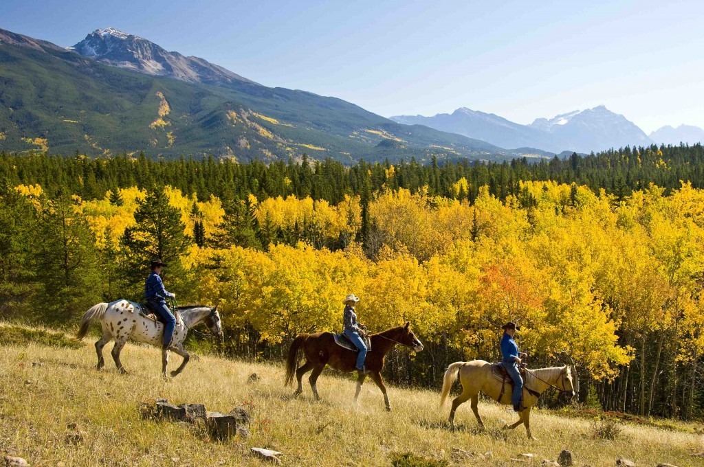 Horseback-Riding-through-Fall-leaves-