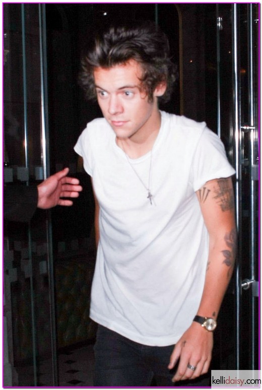 51208164 Celebrities Leaves The Sanderson Hotel In London on September 15, 2013. Harry Styles leaves the Sanderson Hotel in London on September 15, 2013, where the One Direction singer looked casual in a white tee, black jeans and black shoes. FameFlynet, Inc - Beverly Hills, CA, USA - +1 (818) 307-4813 RESTRICTIONS APPLY: USA ONLY