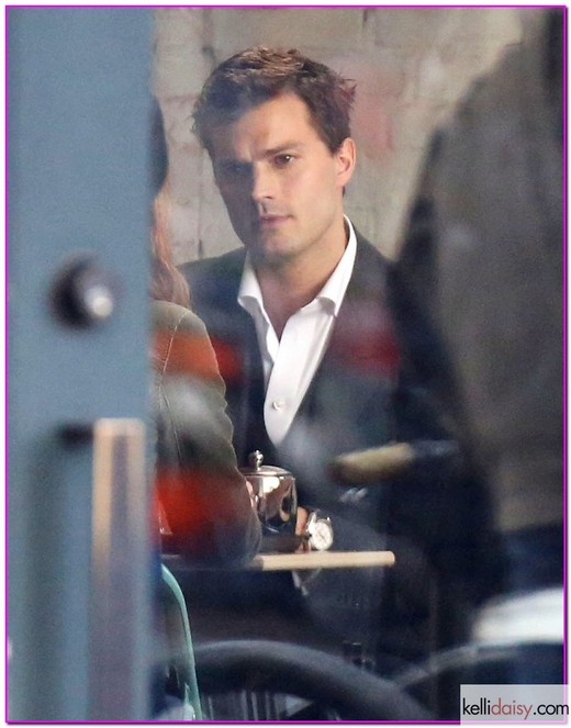 51276058 Actors Jamie Dornan and Dakota Johnson filming a tea date scene at a cafe on the set of 'Fifty Shades Of Grey' in Vancouver, Canada on December 1, 2013. FameFlynet, Inc - Beverly Hills, CA, USA - +1 (818) 307-4813