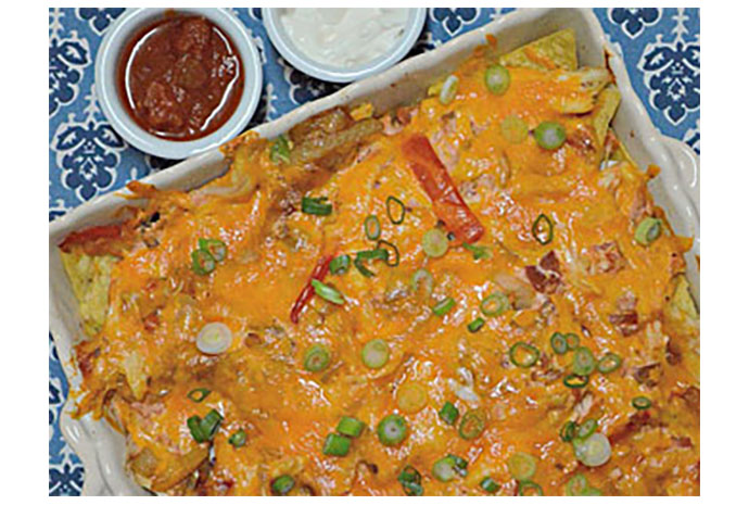 A cheesy chicken casserole is perfect for feeding a crowd (hello, Super Bowl) and can easily be doubled or tripled to accommodate a larger group, if necessary. This dish travels well and works for potluck gatherings; just assemble as per the recipe instructions and bake upon arrival at your destination.