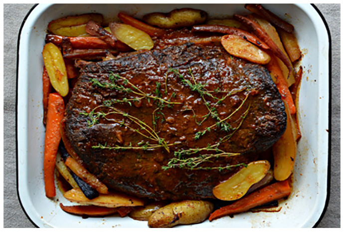 Looking for a make-ahead meal that tastes just as great the next day? Then this brisket is designed for you. Slather the beef with a simple mixture of barbecue and apple sauces and let the meat cook low and slow in the oven while you carry on with other things. Add a few fingerling potatoes and carrots to the pot at the end for a full meal in the making. 