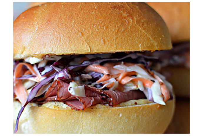 Corned Beef and Cabbage Slaw Sliders This simplified take on the traditional corned beef and cabbage dinner makes eating Irish so easy thanks to the use of deli meat and seasonal veggies. Prep the cabbage and carrots in the morning and have dinner on the table in less than 20 minutes with a mischievous meal the whole family will enjoy.