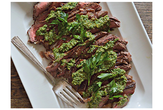 This simple green sauce elevates an ordinary grilled steak into something guest-worthy, making it ideal for serving to your friends. Feel free to toss leftover sauce with hot pasta for a quick side dish, or mix with equal parts mayonnaise to smear over sandwiches. 