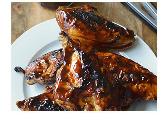 This classic cookout fare is easy enough to feed the family on a busy weeknight because the homemade barbecue sauce is made with common pantry ingredients. Store the extra sauce in the fridge for up to ten days and brush the leftovers over ribs, pork chops and steak. 