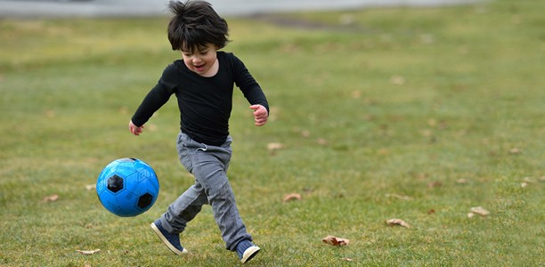 young-boy-chases-ball-612x300 young-boy-chases-ball-612x300