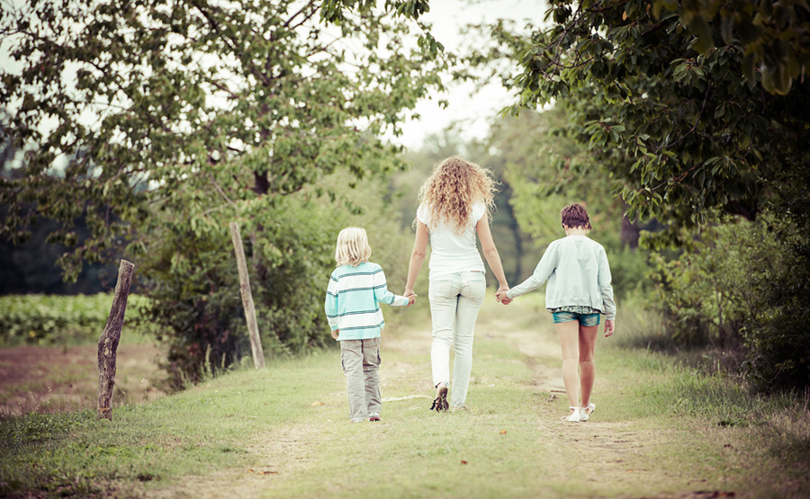 Young-Woman-with-Two-Children-Outside