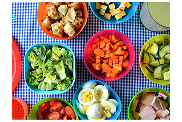 Let your toddlers have control over their own dinner with a build-your-own salad bar. This well-balanced buffet is a great way to introduce your young ones to the idea of eating (and enjoying!) salad for dinner. 