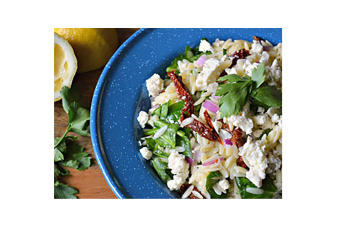 Orzo salads are ideal for summer for a few reasons: they're quick-cooking, inexpensive, fit nicely on a spoon and travel well, making them excellent candidates for summer potlucks and picnics.