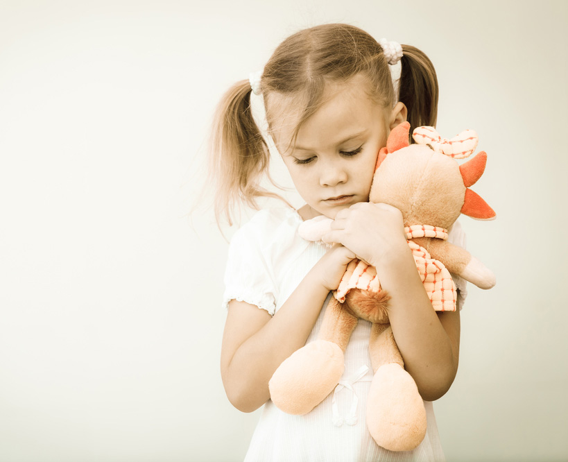 sad-girl-with-her-stuffed-animal