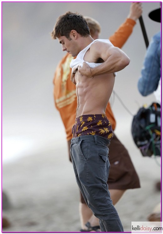 51526853 Actor Zac Efron shows off his toned torso between takes as he films scenes for his new movie "We Are Your Friends" on El Matador beach on September 9, 2014 in Malibu, California. In one scene Zac and a friend passed a joint back and forth as they watched the sunset behind the Pacific ocean. Earlier in the day the hunky star was bruised and bloodied as he filmed a fight scene in a sushi restaurant parking lot. At both locations Zac had no problem showing off his abs to everyone around! FameFlynet, Inc - Beverly Hills, CA, USA - +1 (818) 307-4813
