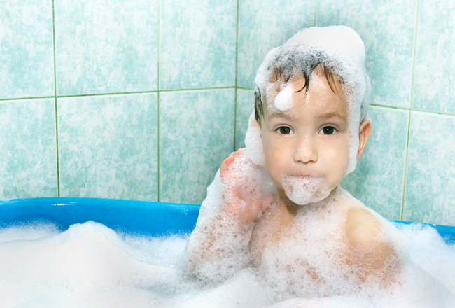 boy-in-the-bath-covered-in-bubbles