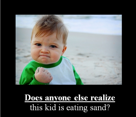 baby-eating-sand