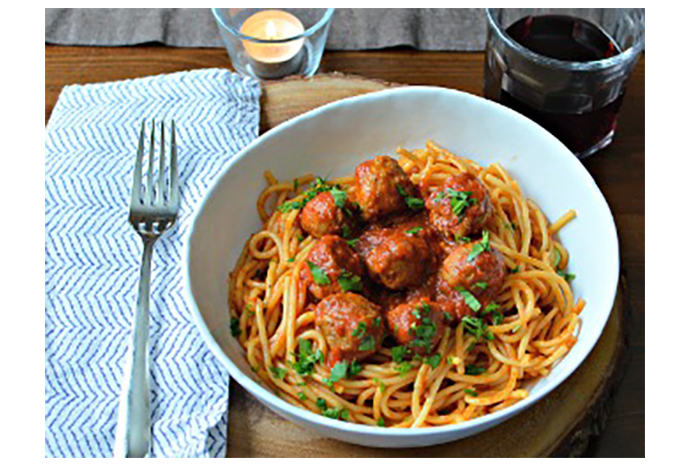 Gathering with friends is a guaranteed way to beat the winter blues and no meal offers more comfort than classic spaghetti with meatballs and marinara. Our time-saving trick is to make the meatballs with sausage meat, eliminating the need to season and saving you lots of time in the kitchen. 