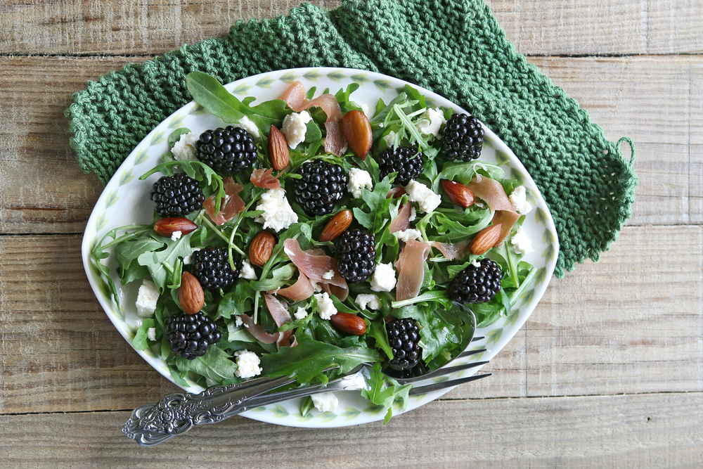 arugula salad with blackberries, feta, almonds and prosciutto