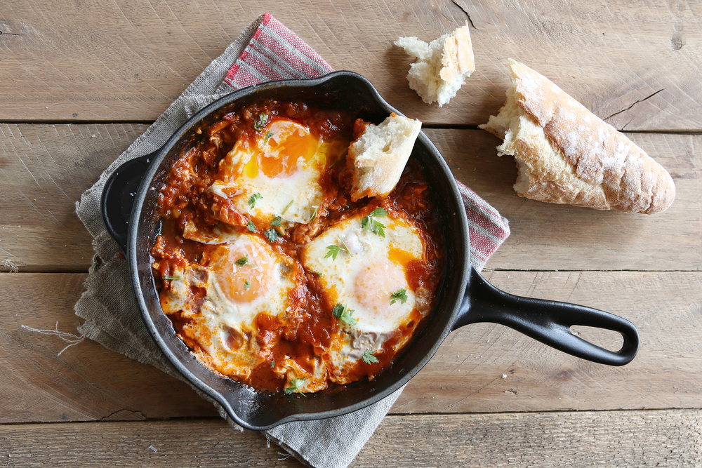 Poached eggs in a spicy tomato sauce, marinara sauce