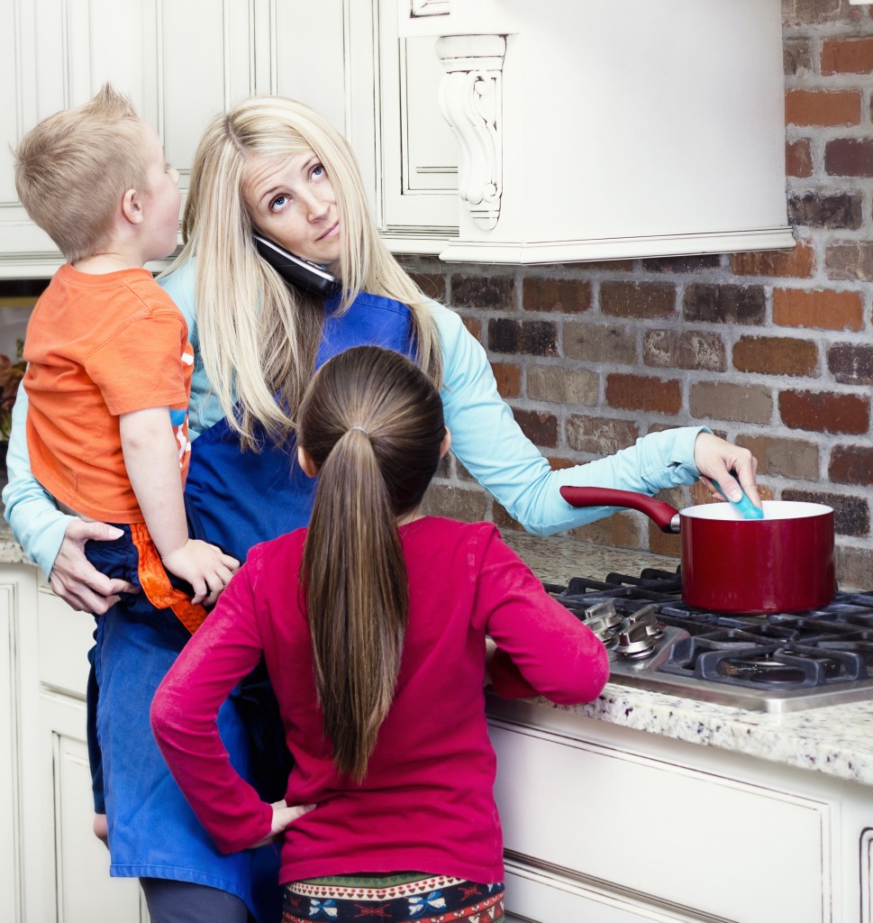 Overwhelmed and frustrated Mom in the kitchen