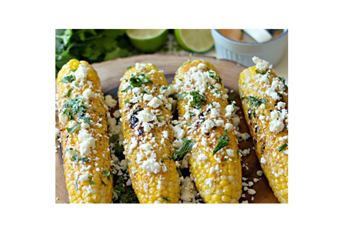 Nothing says ‘party on a platter' quite like grilled corn on the cob slathered with seasoned mayonnaise and sprinkled with feta and cilantro. This quick-cooking side dish is certain to steal the show at any backyard barbecue you're hosting this season, including a casual weeknight one with the kids. 