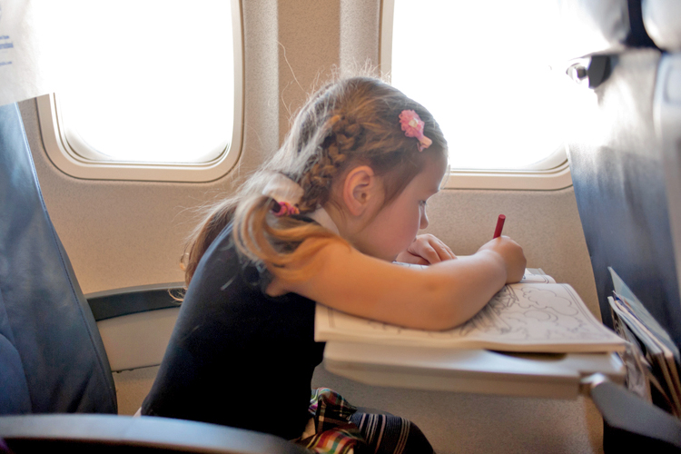 little-girl-on-plane